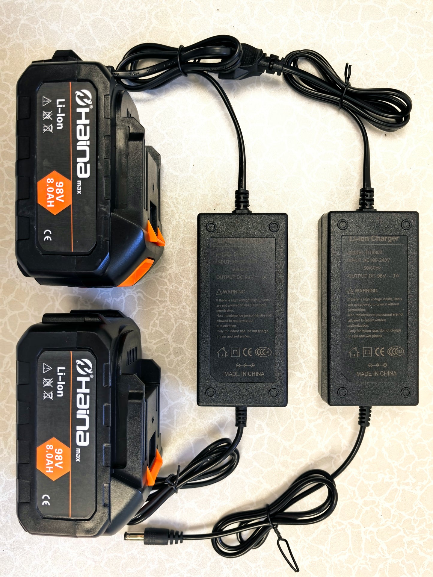 Fierastrau Haina cu lant pe acumulator, 2 baterii, 98V
